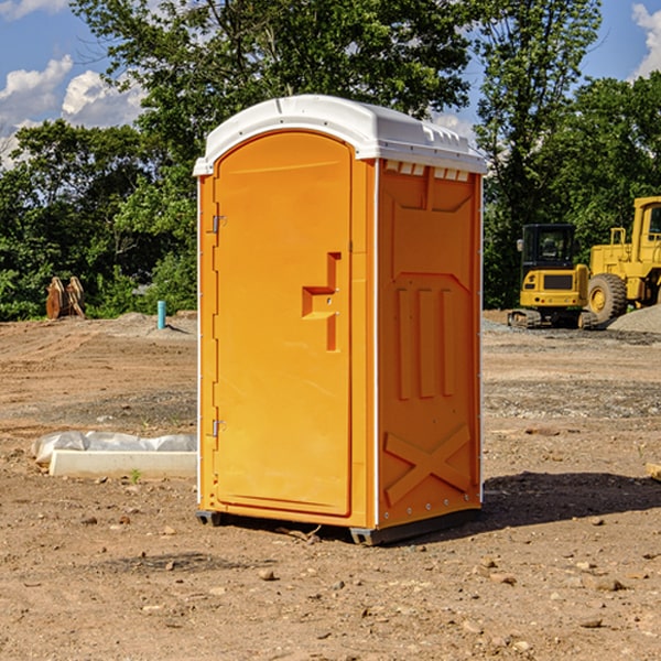 how often are the portable restrooms cleaned and serviced during a rental period in Harrison GA